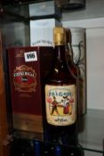 A Bowmore aged 10 years dark and intense single malt scotch whisky (1ltr), a Chivas Regal Extra