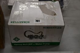 One boxed Schaeffler timing belt and water pump.