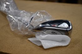 One as new Callaway X Hot 9 iron (Right handed).