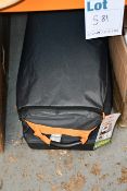 One as new Coleman Cortes Octagon 8 tent in orange.