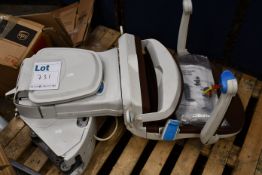 A Minivator 1000 stair lift and rail with key, spare parts and instruction manual.