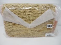 One as new Pamela Munson Las Olas Pearl Flamingo bag.