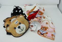 Two as new Terry bear bag. Two as new Minnie headbands (no tags). Two as new Teddy bear headbands (