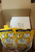 Two sets of AED paediatric defibrillation pads and two sets of adult defibrillation pads.