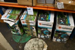 Four boxed Gardena wall-mounted automatic hose boxes 8024 (Some items may be slightly damaged or