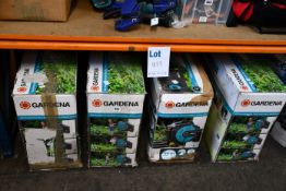 Four boxed Gardena wall-mounted automatic hose boxes 8024 (Some items may be slightly damaged or