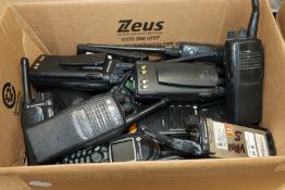 A quantity of pre-owned miscellaneous portable two-way radios and related items to include