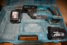A pre-owned Makita cordless screwdriver with two batteries.
