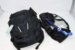 One as new CamelBak M.U.L.E. Packs black (2245001000). One as new CamelBak Repack 4 LR drinking belt