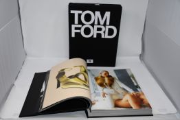 One boxed as new Tom Ford ten year hardback book by Graden Carter and Bridget Foley.