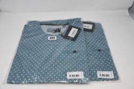 Two as new light blue Ted Baker geo printed SS t-shirts (Size 4, RRP £109 each).