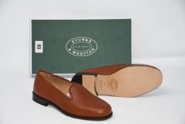 A pair of boxed as new Stubbs & Wootton football slippers, orange (UK 8).