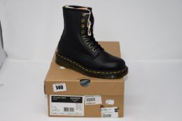 One as new Dr. Martens Vegan 1460 black boots. Size: UK 3.