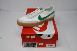 A pair of Nike Kill shot 2 leather trainers with green tick (UK7).