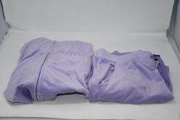 An as new Baby Phat lilac two piece lounge set (M top - L bottoms).
