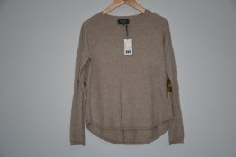 An as new Wyse of London beige jumper with gold sequin star to the elbow of sleeve (Size 1).
