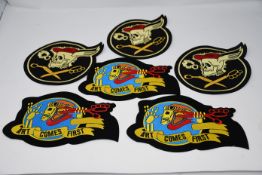 One large quantity of Art Comes First patches.