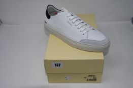 One boxed Axel Arigato Clean 90 Triple. Colour: black/pink/red. Size: UK: 9.5 (28489-44).