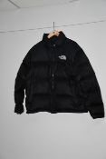 One pre-owned The North Face black jacket size L.