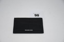 One Balenciaga card and coin holder wallet (Colour: Black).
