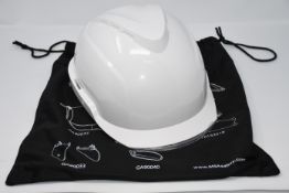 One as new MSA V-Gard 950 safety helmet in white.