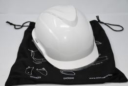 One as new MSA V-Gard 950 safety helmet in white.