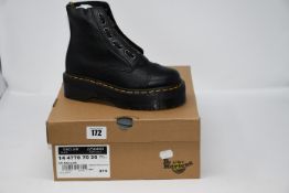 One pair of lady's boxed as new Dr. Marten's Sinclair platform boots in black (UK 4).