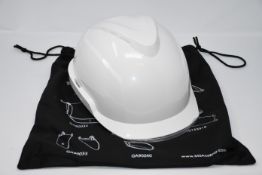One as new MSA V-Gard 950 safety helmet in white.