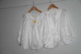 Two Maeve Anthropologie white shirt size S.