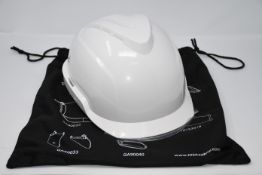 One as new MSA V-Gard 950 safety helmet in white.