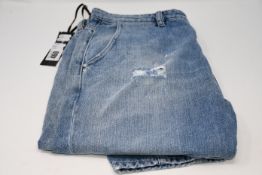 A pair of as new Nine In The Morning jeans (Size TG28?).