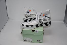 A pair of as new Off White X Converse Chuck Taylor 70 sneakers (UK 9 - Slight marks on rubber and
