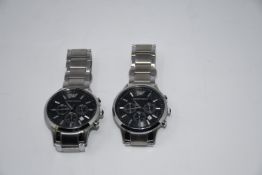 Two Emporio Armani stainless steel watches.