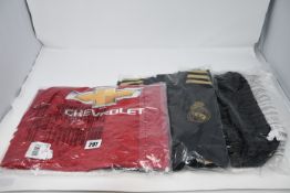 One as new Adidas Madrid training top age 13-14 (Model: DX7821). One as new Adidas Manchester United