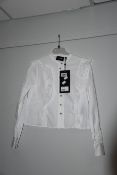 An as new The Kooples Basic blouse (Size 1 - RRP €148).