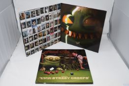 Three boxed as new High Street Creeps Feed Me signed vinyl's (BCVA do not guaranteed the