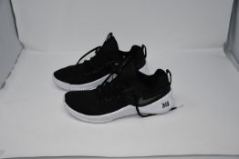 One pair Nike Training Metcon free trainers in black. Size UK 10 (AH8141-001).
