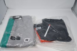 One as new Puma Mercedes Men Track pants size M (Model: 598039). One as new Jack Wolfskin Overland