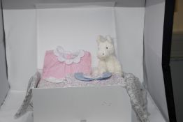 One box containing as new The Little White Company baby clothing and blankets.