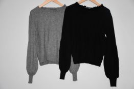 An as new Wyse of London black balloon sleeved jumper with frill round neck (Size1) and one as new