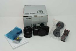 A boxed as new Canon EOS M200 Mirrorless Camera with EF-M 15-45 mm f/3.5-6.3 IS STM Lens in Black (