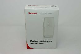 A boxed as new Honeywell Wireless Pet-Immune Motion Sensor IPRPI8EZS (box sealed).