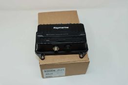 A boxed as new Raymarine AIS700 Class B Transceiver With Integrated Splitter (P/N: E70476).