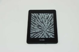 A pre-owned Amazon Kindle Paperwhite 4 (PQ94WIF) 6” E-Reader in Black.