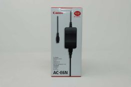 A boxed as new Canon AC-E6N Adaptor.