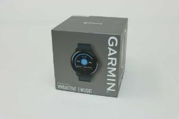 A boxed as new Garmin Vivoactive 3 Music GPS Smartwatch in Black (Box sealed).