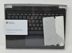 A boxed as new Microsoft Surface Pro Signature Type Cover (for Surface Pro 5,6 & 7) (Some cosmetic