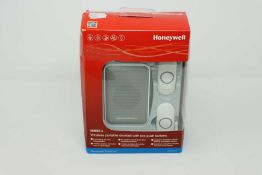A boxed as new Honeywell Series 3 DC311NBS Wireless Plug-in Doorbell with push button in White (
