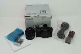 A boxed as new Canon EOS M200 Mirrorless Camera with EF-M 15-45 mm f/3.5-6.3 IS STM Lens in Black (