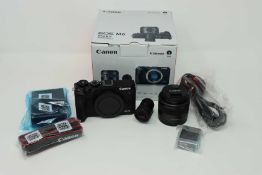 A boxed as new Canon EOS M6 Mark II Mirrorless Camera in Black with EF-M 15-45mm IS STM Lens and